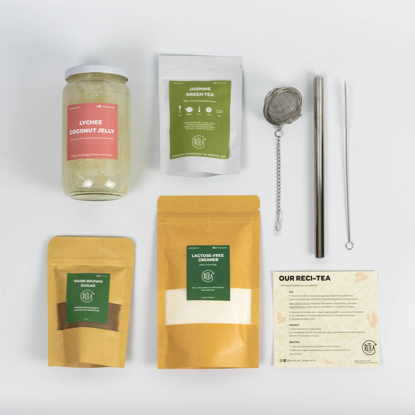 Flat lay shot of jasmine milk tea bubble tea kit with lychee coconut jelly
